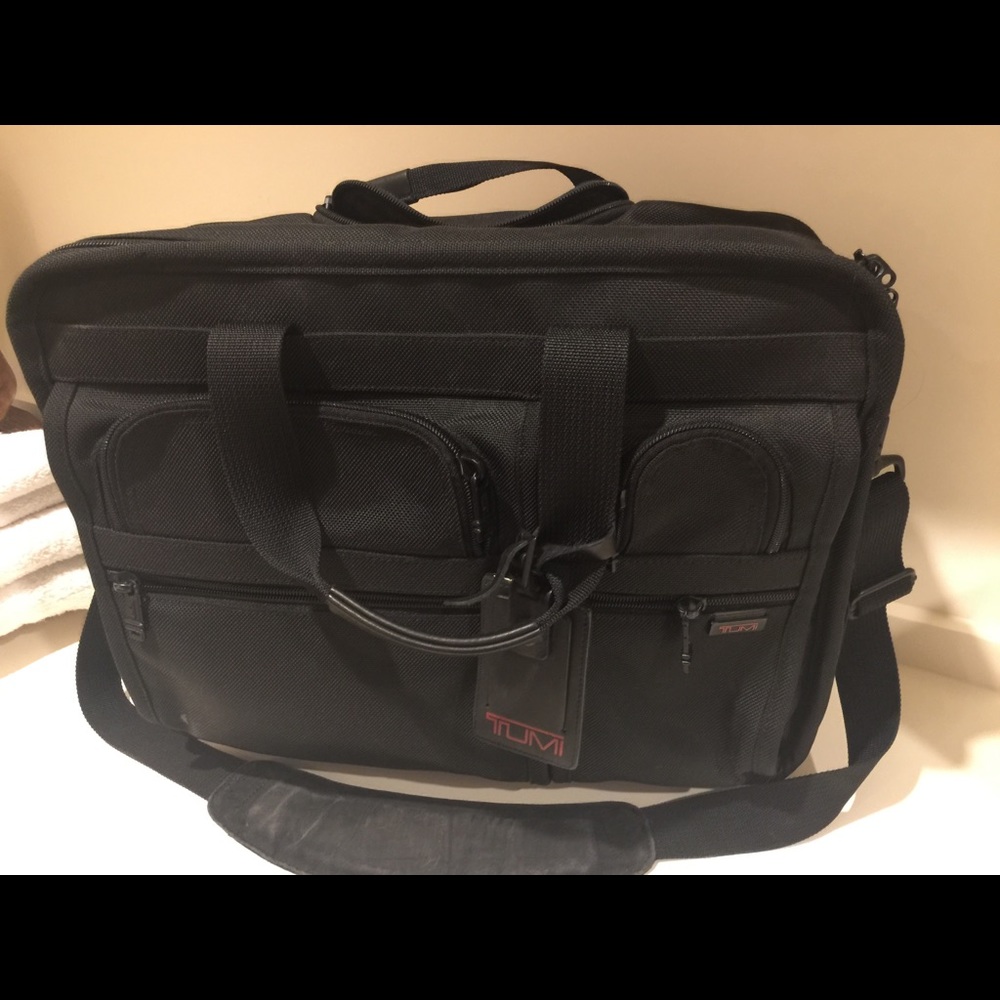 3 TUMI bags.  2 carry on and 1 suit bag. Black.